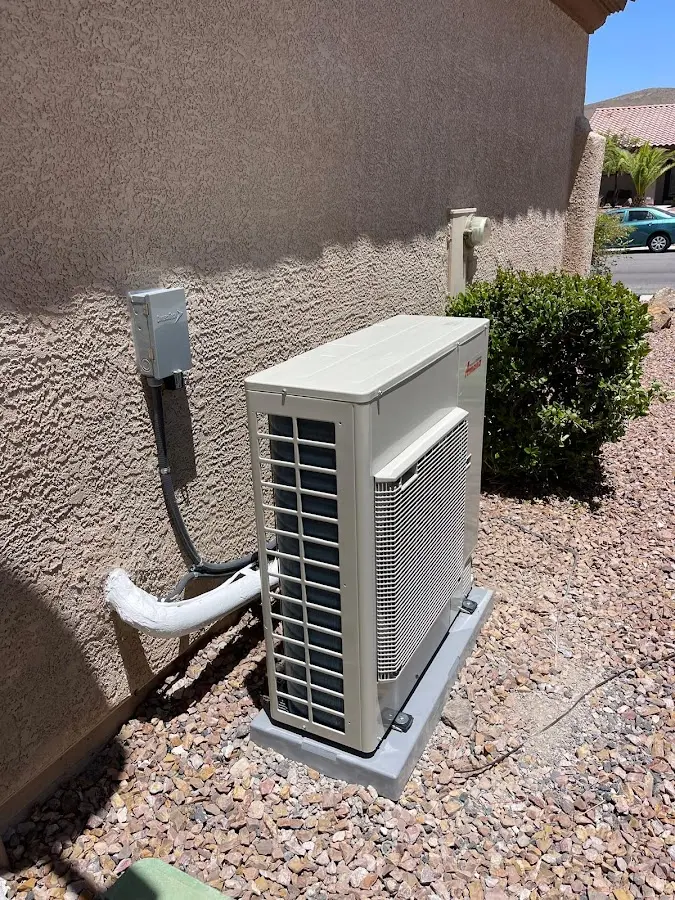Residential air conditioning condenser unit in Athens